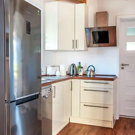 Сasa de vacaciones Domektomek Z Kominkiem I Ogrodem 1000m Niechorze